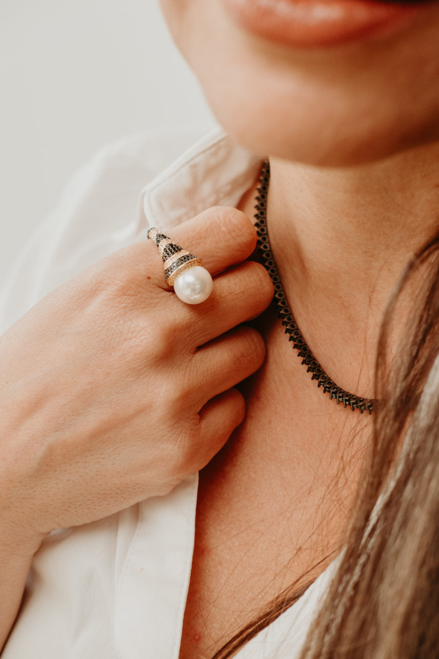 black zirconia tennis necklace worn on model elegant evening jewelry silver luxury styling
