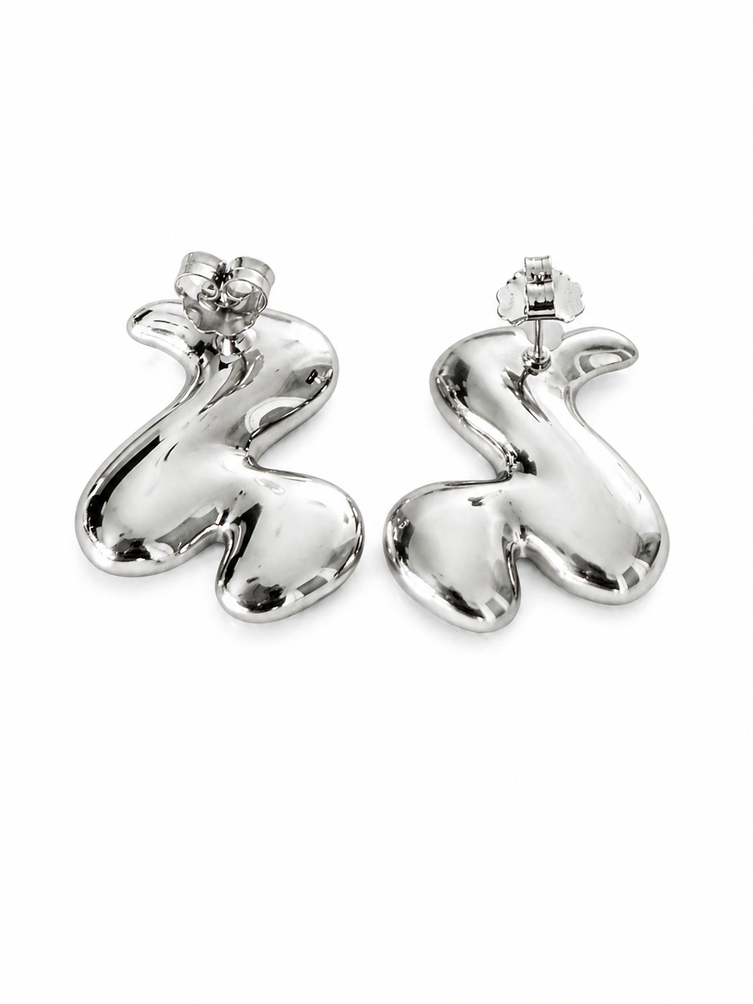 rhodium polished sculptural earrings with matte front and high polish back dual finish luxury jewelry detail