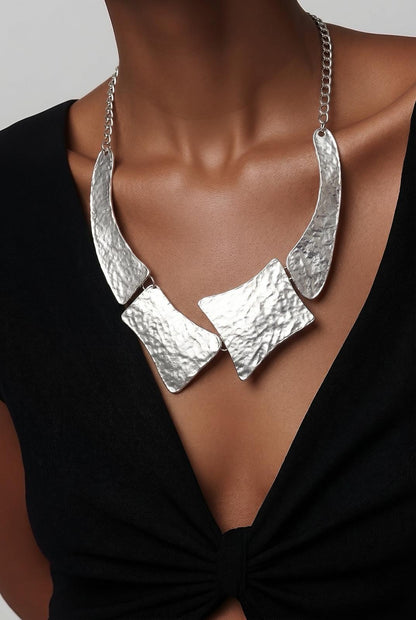 rhodium sculptural choker necklace styled for women elegant modern statement jewelry minimal luxury look