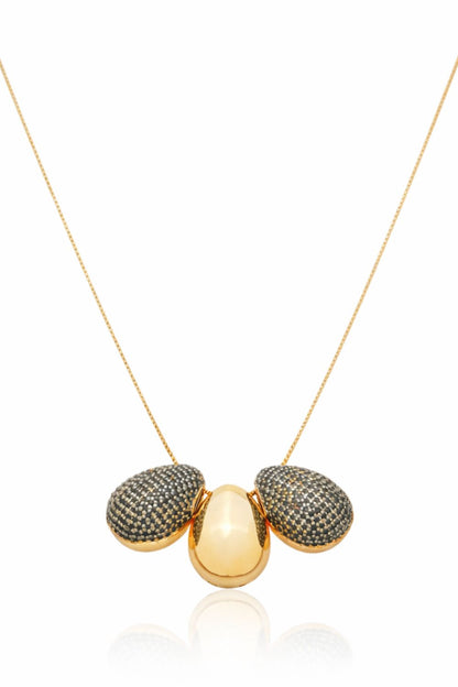Eclipse In Black 18K gold plated necklace with three sculptural teardrop forms and black zirconia detailing