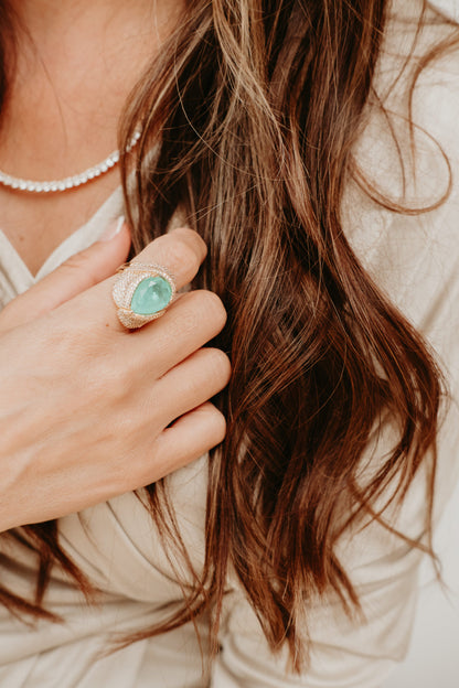 tourmaline cocktail ring worn on hand gold zirconia statement ring luxury styling for women