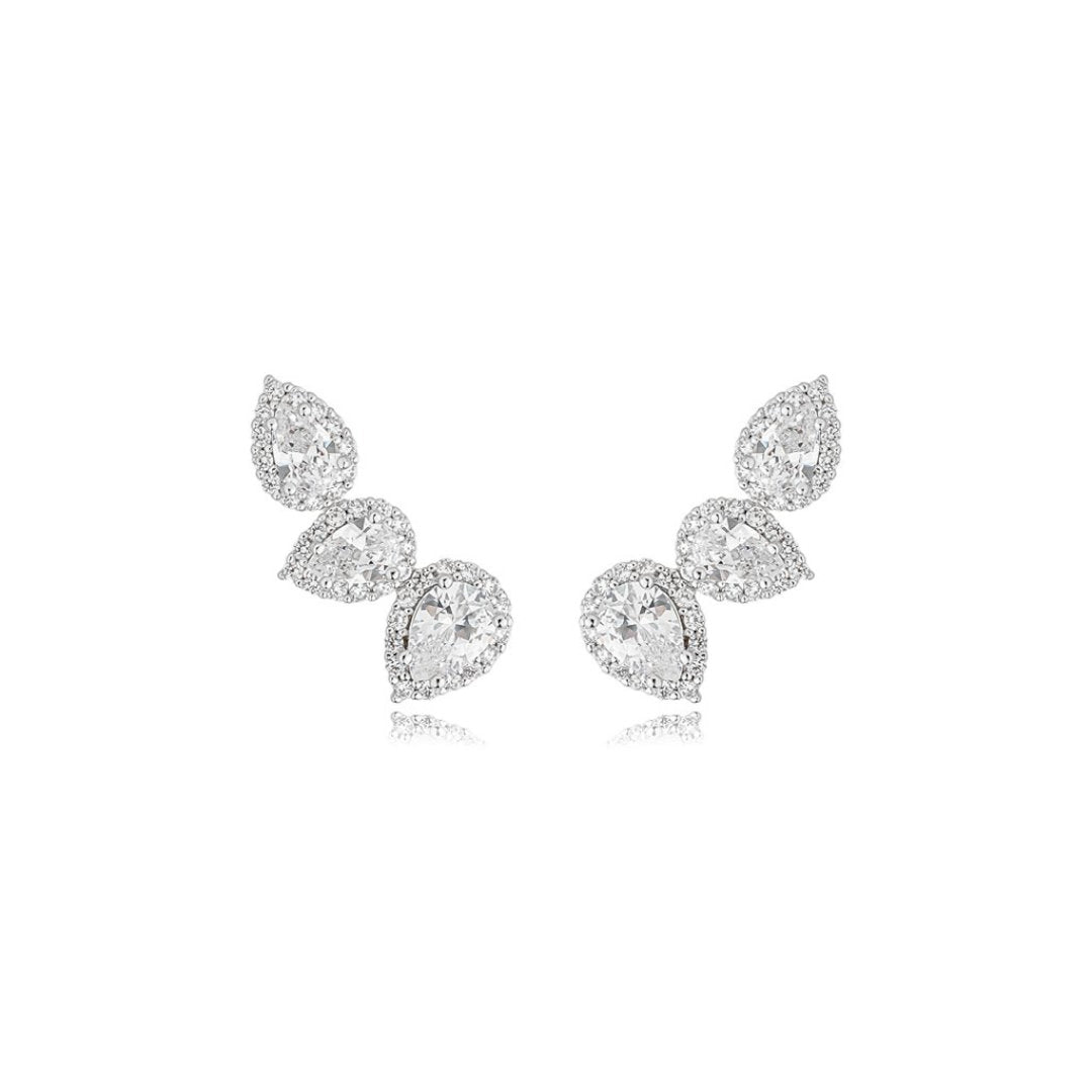 Clear zirconia statement earrings featuring graduated pear shaped stones in an elegant rhodium ear climber design