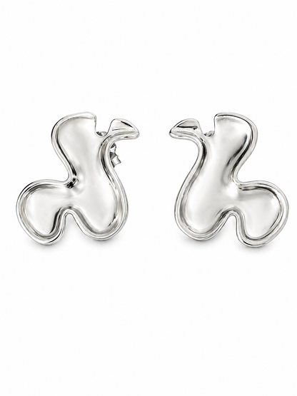 rhodium plated sculptural statement earrings | Liquid Metal asymmetrical modern luxury jewelry for women