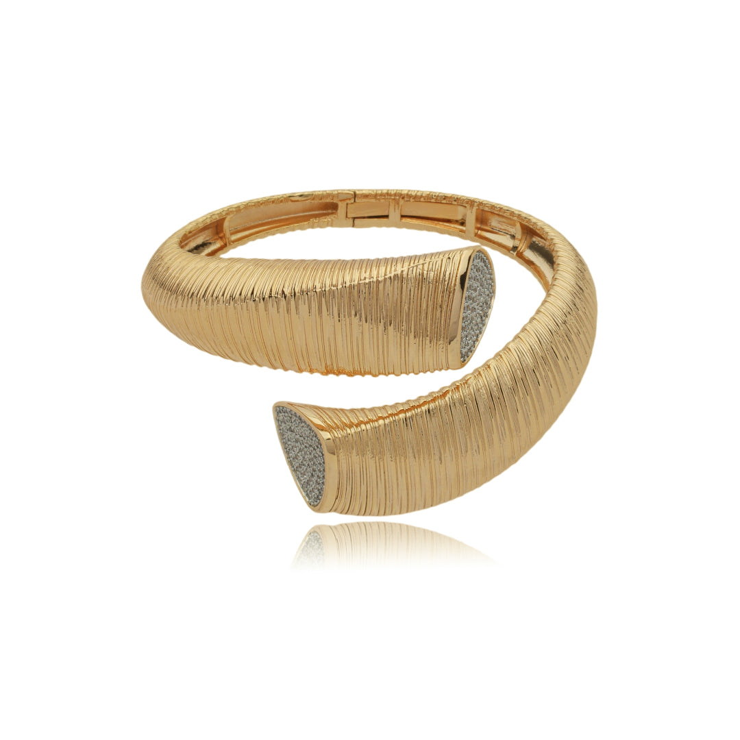 18K gold plated sculptural open cuff bracelet with textured finish and pavé zirconia stone ends