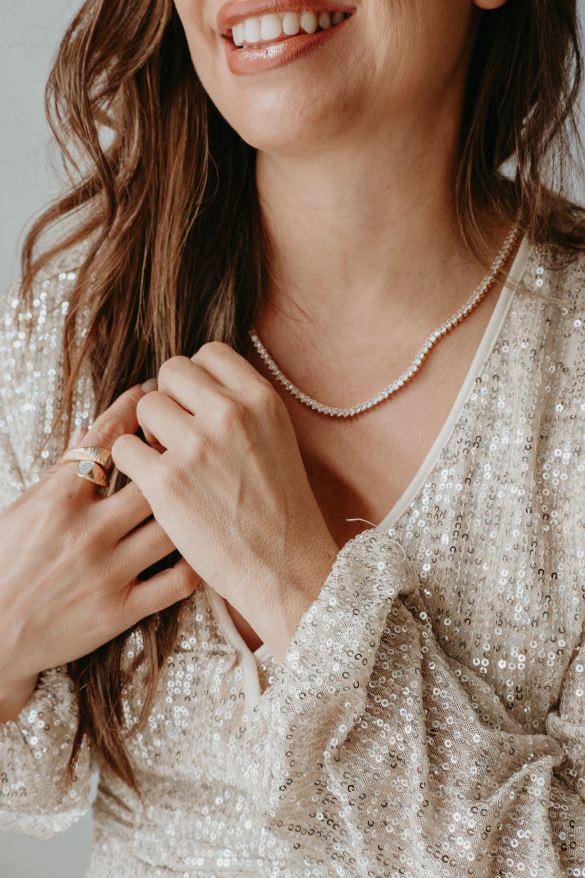 gold tennis necklace styled for women elegant everyday and evening luxury jewelry look