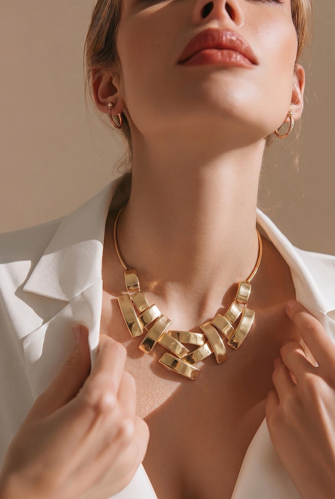 18K gold plated geometric statement necklace featuring bold interlocking rectangular links and adjustable chain
