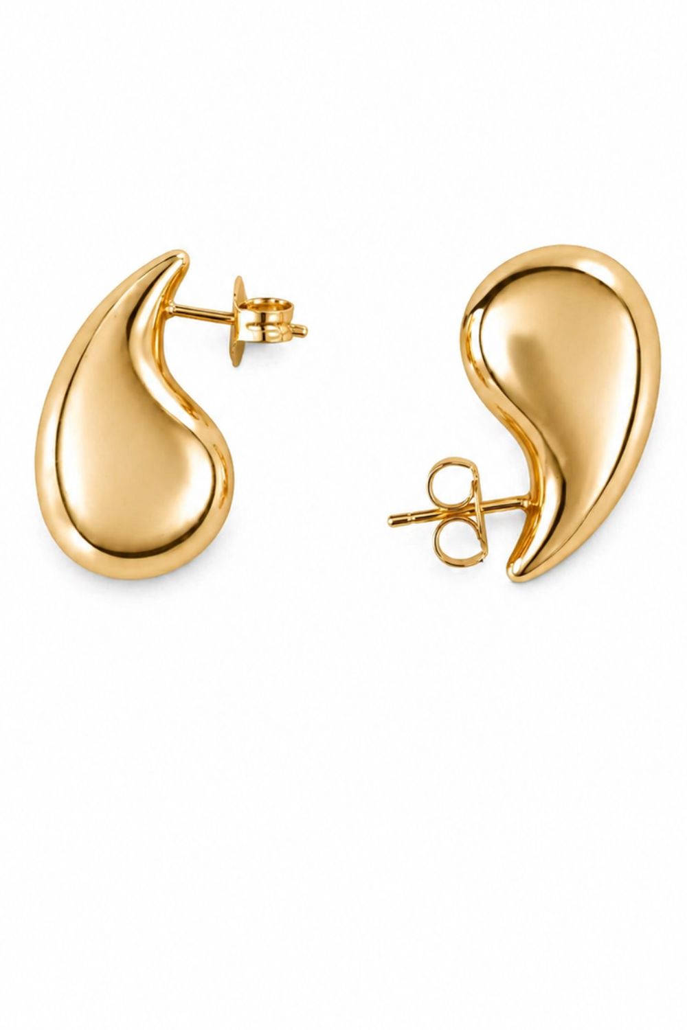 gold teardrop earrings with dimensional groove detailing polished sculptural jewelry design