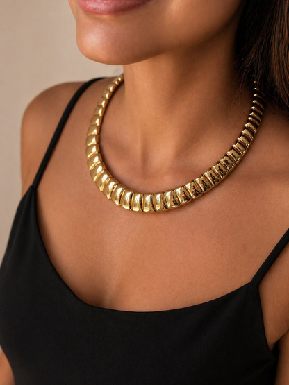 bold gold collar choker necklace structured statement jewelry for modern luxury look
