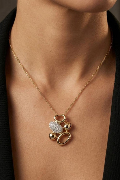 18K gold plated chain necklace with sculptural pendant and sparkling zirconia statement centerpiece